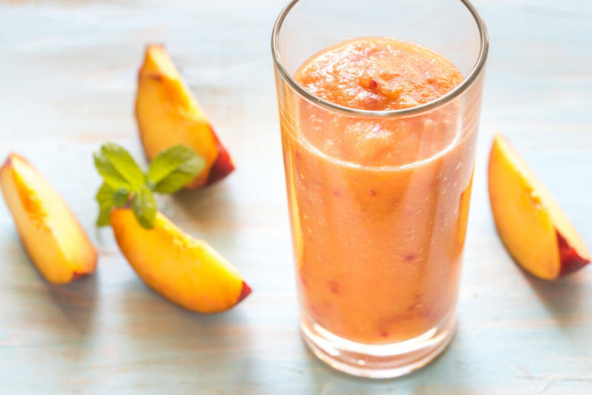 Peach smoothie in glass with slices of peaches-Combatting loss of appetites in older adults
