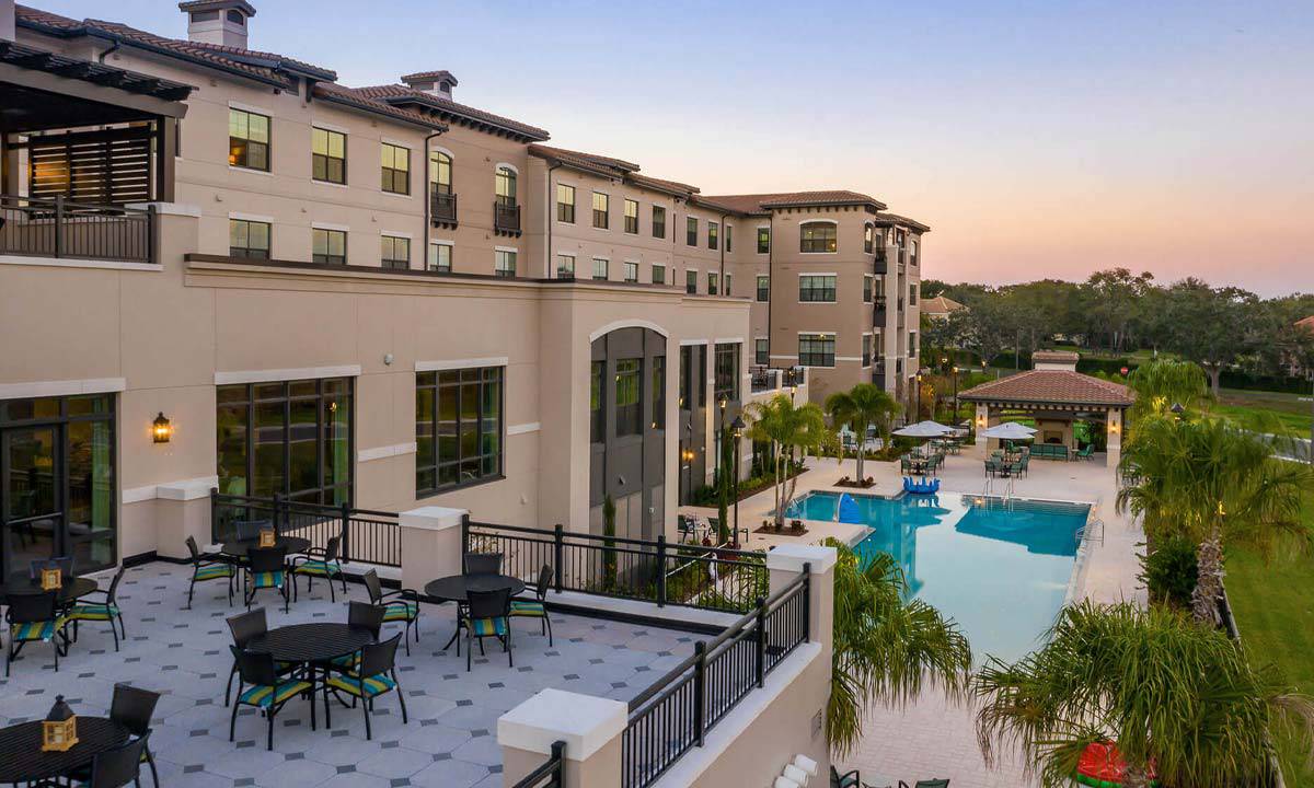Exterior-Balcony and Pool View-HarborChase of Dr. Phillips-Orlando Senior Living