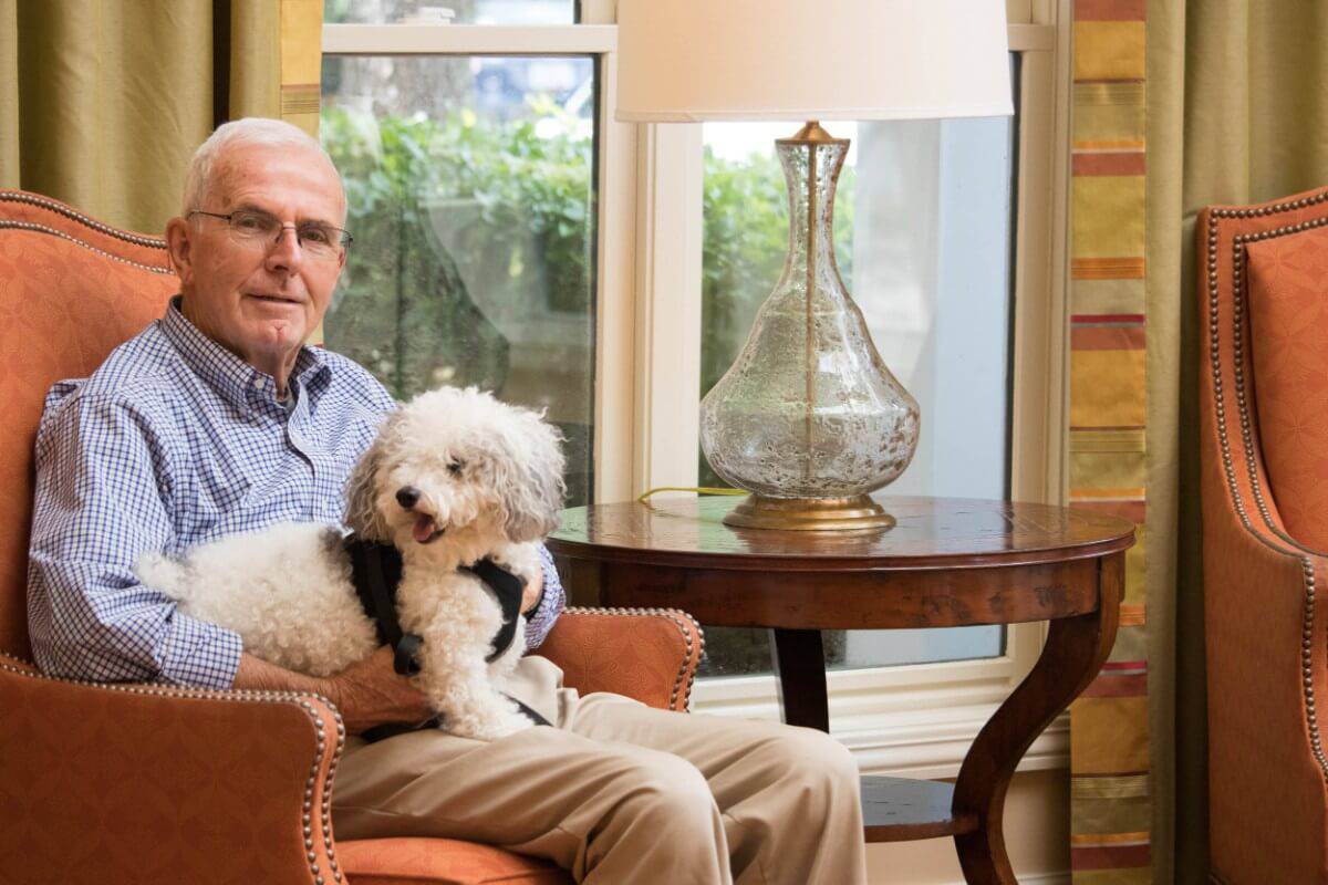 Lifestyle-Resident with Dog-HarborChase of Jacksonville-Florida Senior Living
