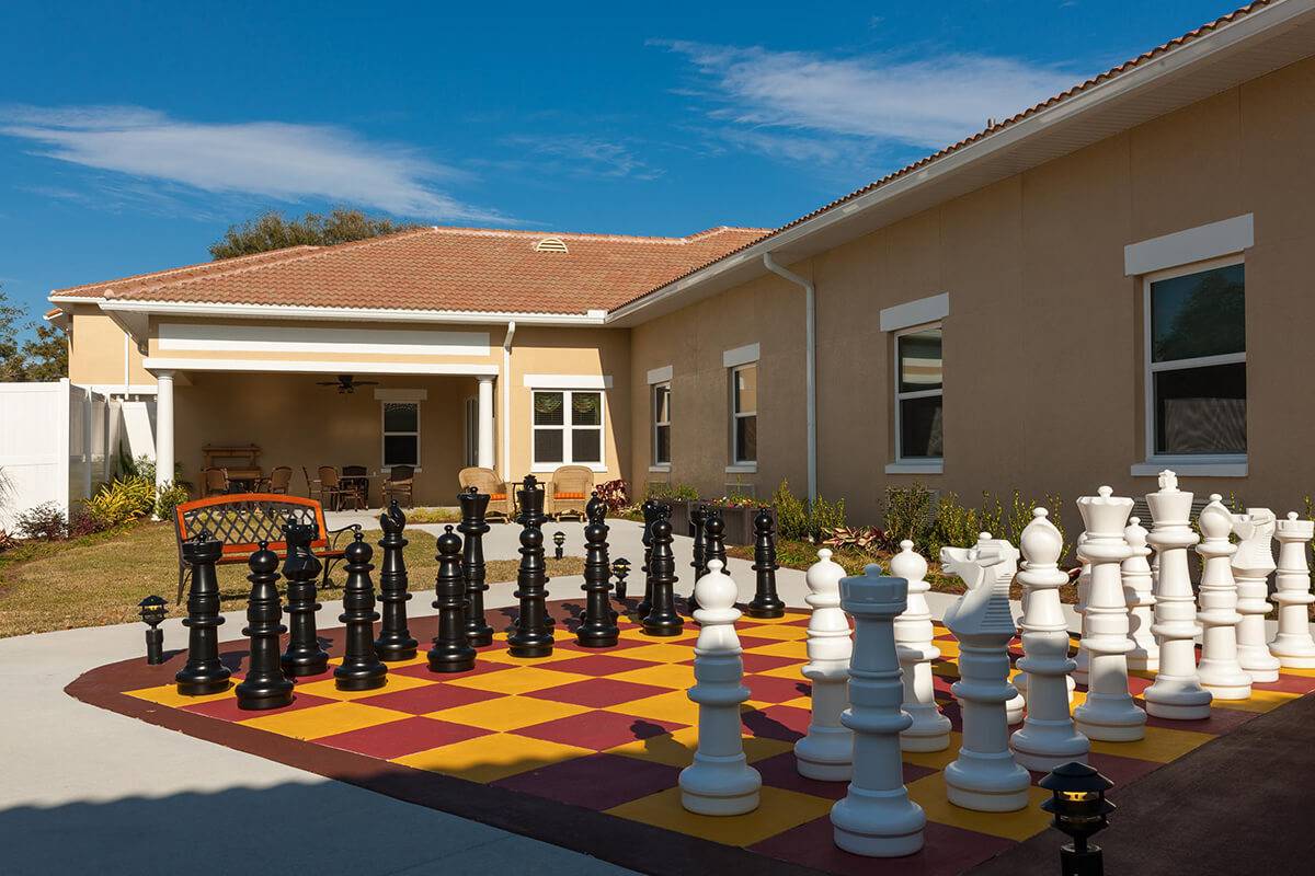 Exterior-Giant Chess Board-HarborChase of Villages Crossing-Senior Living in Lady Lake, Florida