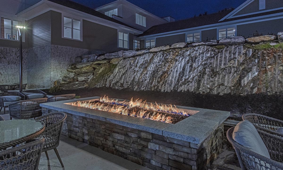 Exterior-Sitting Area with Fireplace-HarborChase of South Portland-Maine Senior Living