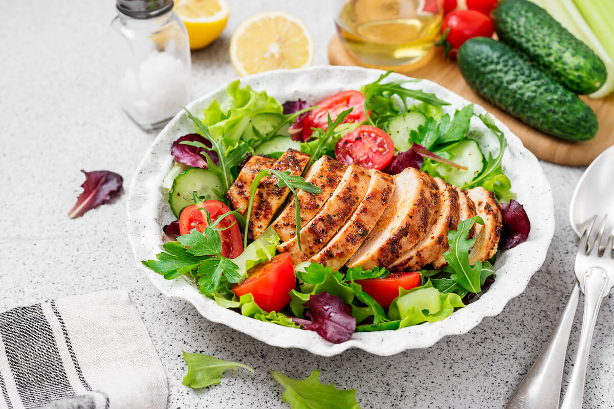 Grilled chicken breast, fillet and fresh vegetable salad. Healthy lunch menu-HarborChase Senior Living