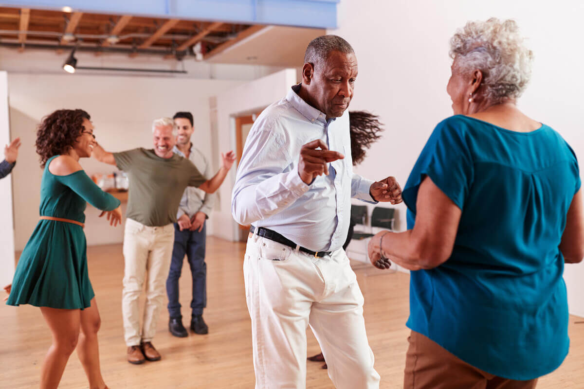 Group of older adults dancing_ Start Enjoying Senior Living Sooner Rather Than Later