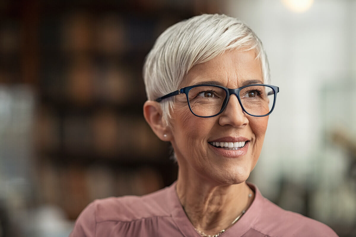 Older woman wearing black glasses-Senior Eye Health