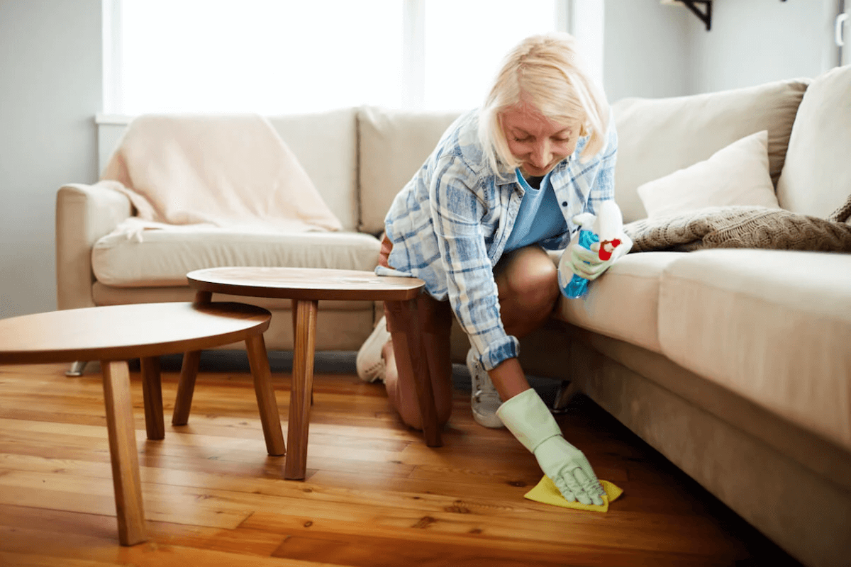 house-cleaning-worker-wiping-floor-with-napkin-Tips for spring cleaning