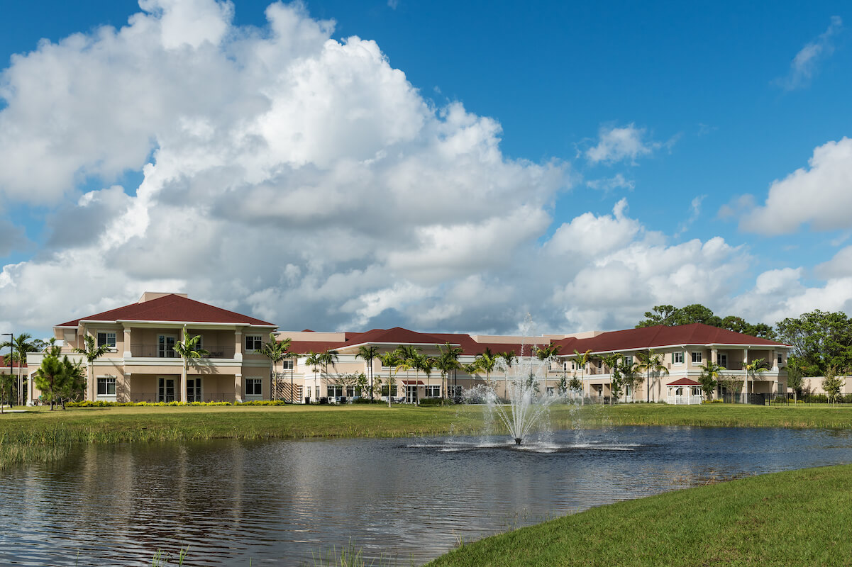 Rear Exterior Over Water-HarborChase of Wellington Crossing, Florida Senior Living