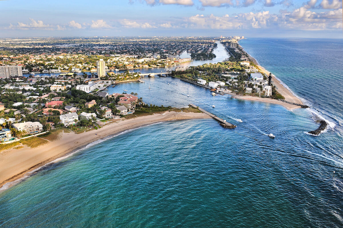 aerial view of hillsboro inlet from atlantic ocean to intracoastal waterway in southeast florida