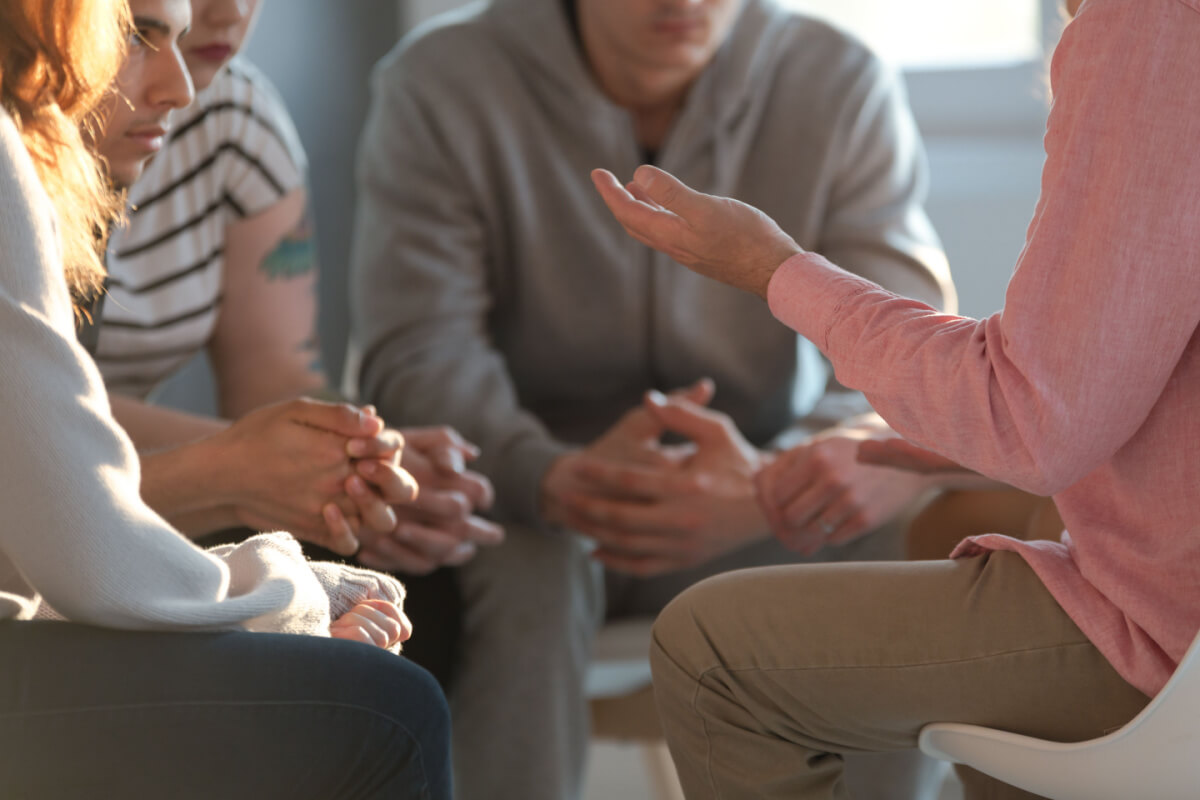 People in a support group sitting in a circle