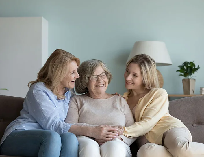 Mother and Daughters smiling